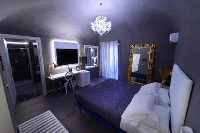 Letto o letti in una camera di Etna Suite Group