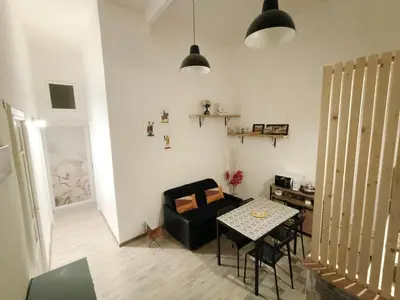 Area soggiorno di Domus Etna