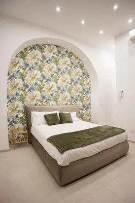 Letto o letti in una camera di Cinere Rooms