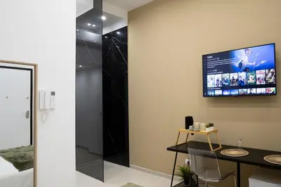 TV o dispositivi per l'intrattenimento presso Cinere Rooms