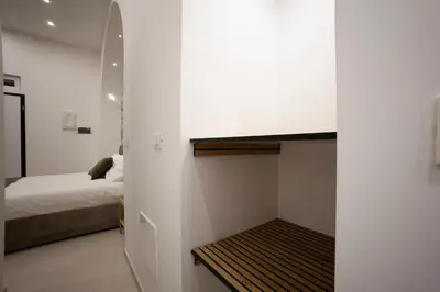 Letto o letti in una camera di Cinere Rooms