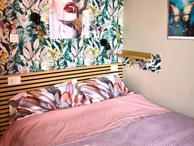 Letto o letti in una camera di EnjoyCasa Tra Sole Mare e L'Etna
