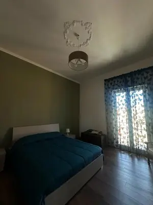 Letto o letti in una camera di Dimora Sikana
