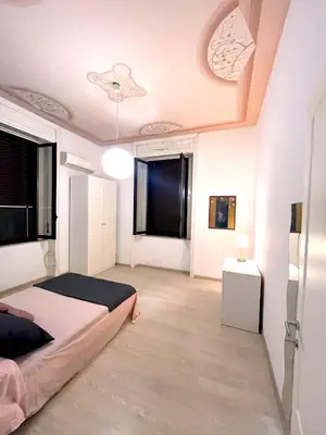 Letto o letti in una camera di Deodato guesthouse