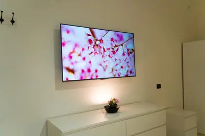 TV o dispositivi per l'intrattenimento presso The House quattro punto zero