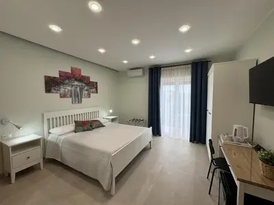 Letto o letti in una camera di B&B Milicia