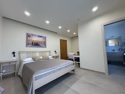 Letto o letti in una camera di B&B Milicia
