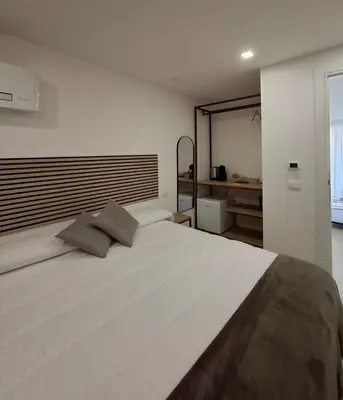 Letto o letti in una camera di sikelia rooms