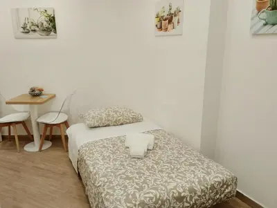 Letto o letti in una camera di Live & Love Catania