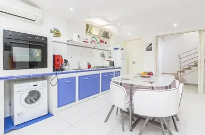 Cucina o angolo cottura di Dimora delle Palme Scogliera