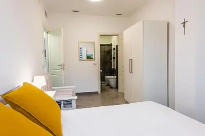 Letto o letti in una camera di Oasi Agrumi e Mare
