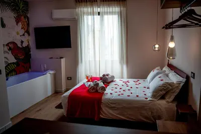 Letto o letti in una camera di Luxury Fire Home - Catania