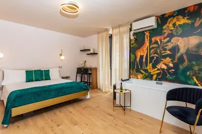 Letto o letti in una camera di Luxury Fire Home - Catania