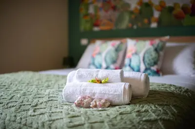 Letto o letti in una camera di Terra d'Agrumi Rooms