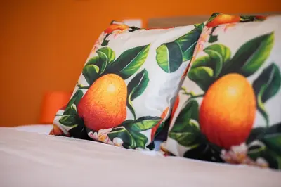 Letto o letti in una camera di Terra d'Agrumi Rooms