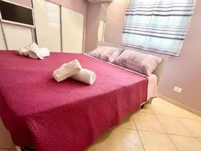 Letto o letti in una camera di la Casa di Gabriella