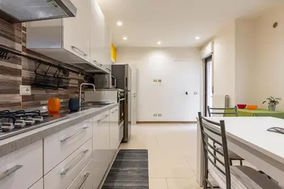 Cucina o angolo cottura di GuestHost - Rifugio dei Sogni