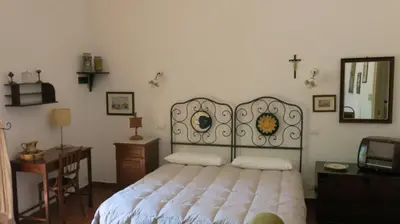Letto o letti in una camera di Etna B&B La casa di Pippinitto