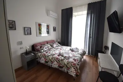 Letto o letti in una camera di La Corte Fiorita