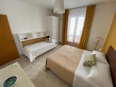 Letto o letti in una camera di MMBook Casa Gebel Etna View