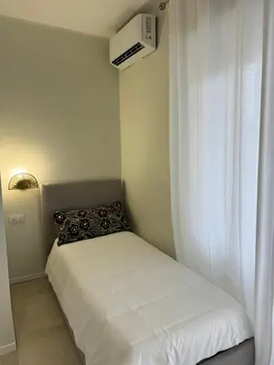 Letto o letti in una camera di Dimora dei Vespri 2