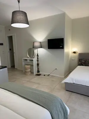 Letto o letti in una camera di Dimora dei Vespri 2