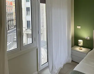 Letto o letti in una camera di Dimora dei Vespri 2