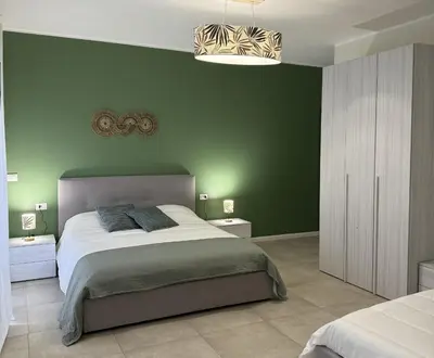 Letto o letti in una camera di Dimora dei Vespri 2