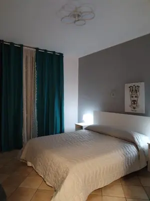 Letto o letti in una camera di La Perla Etnea ex