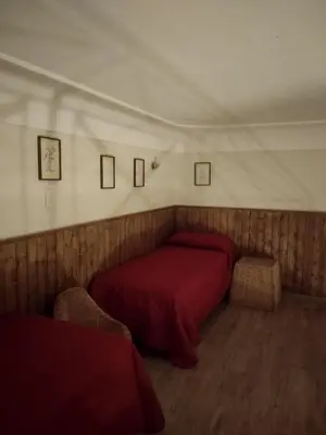 Letto o letti in una camera di Etna Rooms Villa Rosa