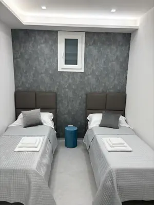 Letto o letti in una camera di Camastra house
