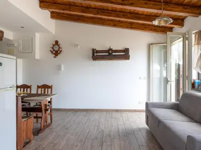 Area soggiorno di Apartment Castagno by Interhome