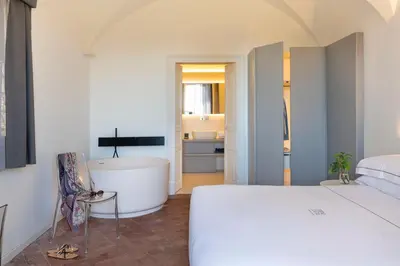 Letto o letti in una camera di Ramo d'Aria Etna Boutique Hotel