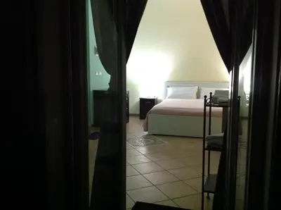 Letto o letti in una camera di Terrazze Bella Epoque