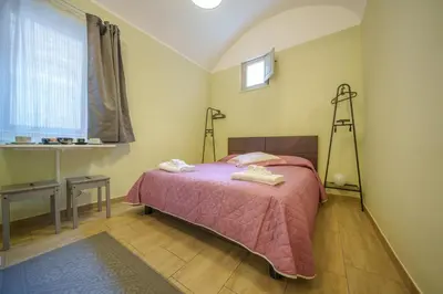 Letto o letti in una camera di Casa Capuana