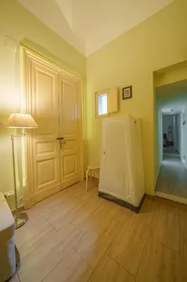 Letto o letti in una camera di Casa Capuana