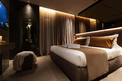 Letto o letti in una camera di Donna Filomena Luxury Suites