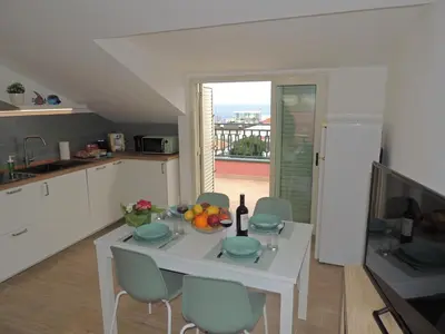 Cucina o angolo cottura di LA SCOGLIERA - Apartment