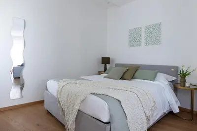 Letto o letti in una camera di Acacie Apt