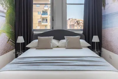 Letto o letti in una camera di Giglio Apartment