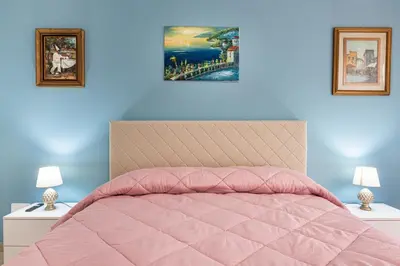 Letto o letti in una camera di StesicoROOM