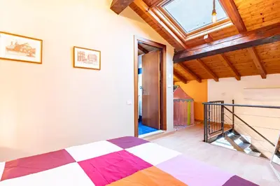 Letto o letti in una camera di GuestHost - Le Ciminiere Home - Central apt near the station