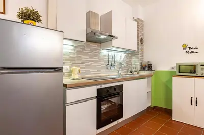 Cucina o angolo cottura di GuestHost - Le Ciminiere Home - Central apt near the station