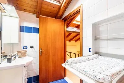 Letto o letti in una camera di GuestHost - Le Ciminiere Home - Central apt near the station