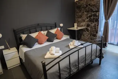 Letto o letti in una camera di B&B Verga