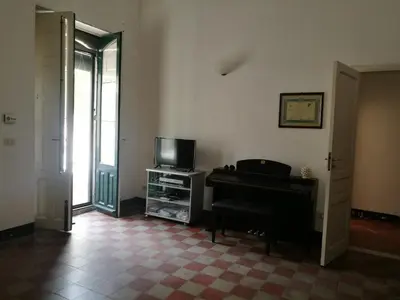 TV o dispositivi per l'intrattenimento presso Typical house in a Sicilian village