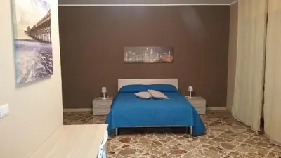 Letto o letti in una camera di Don Pedro Rooms Riposto