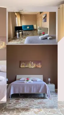 Letto o letti in una camera di Don Pedro Rooms Riposto