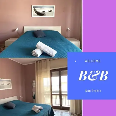 Letto o letti in una camera di Don Pedro Rooms Riposto