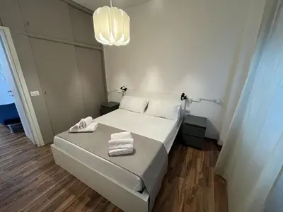Letto o letti in una camera di Casa Fiera Catania